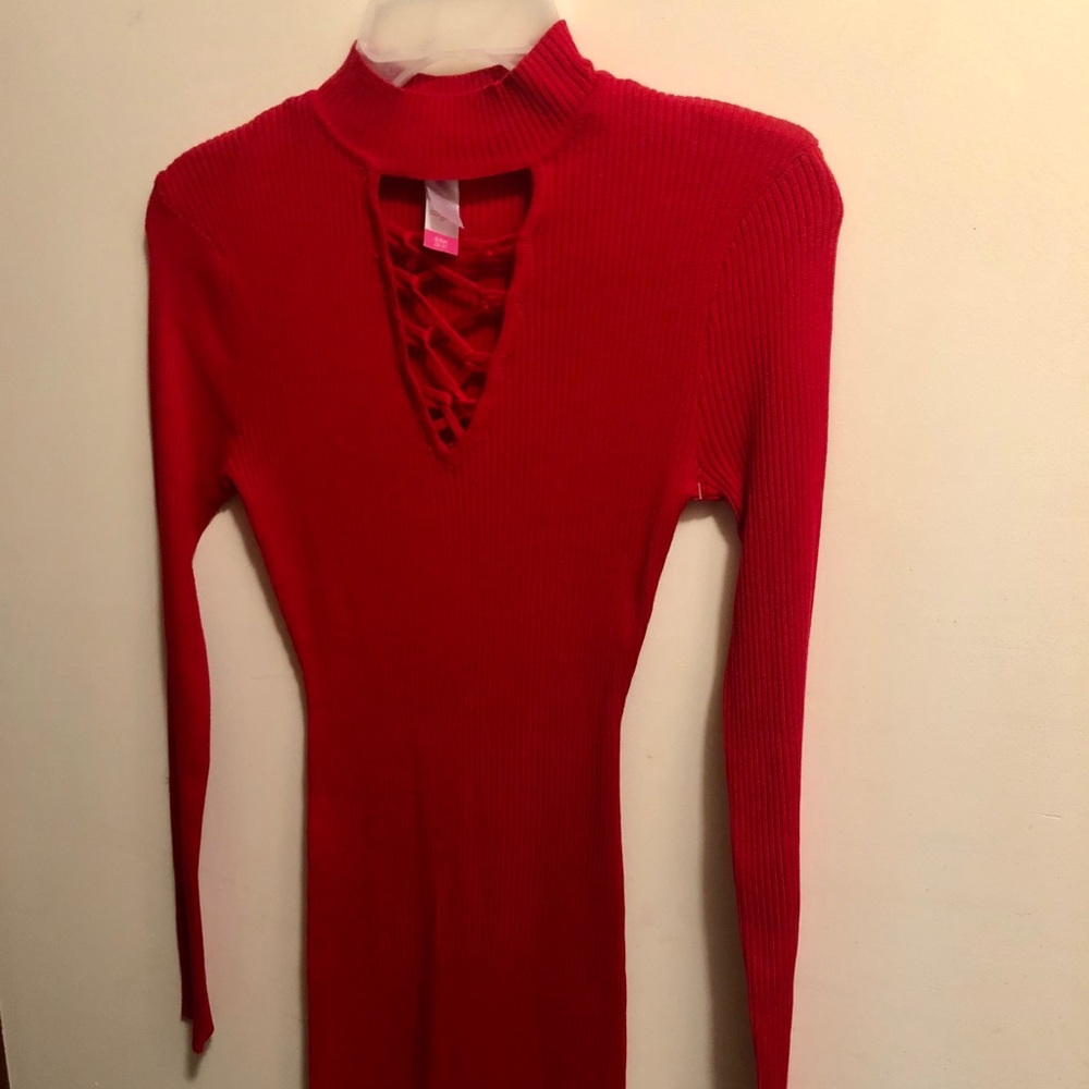 A vibrant red sweater dress